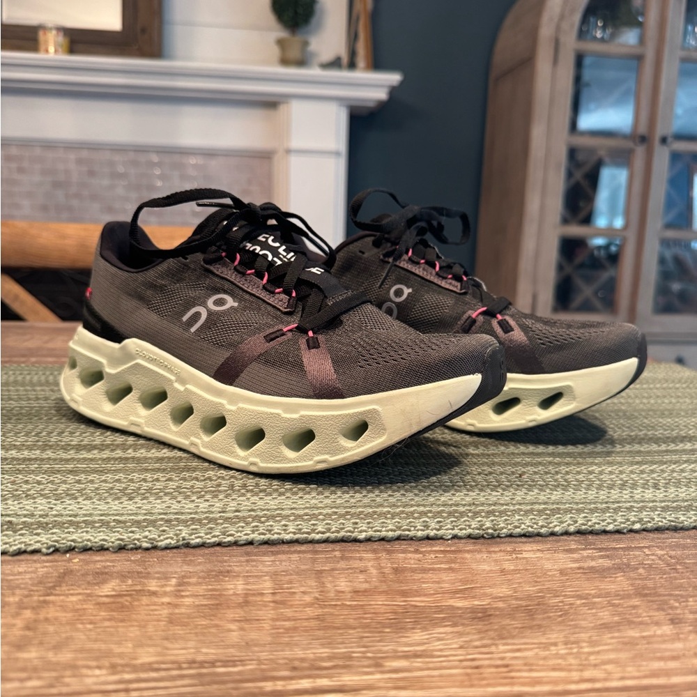 On Running Cloudmonster Women's Running Shoes in Black and Light Mint